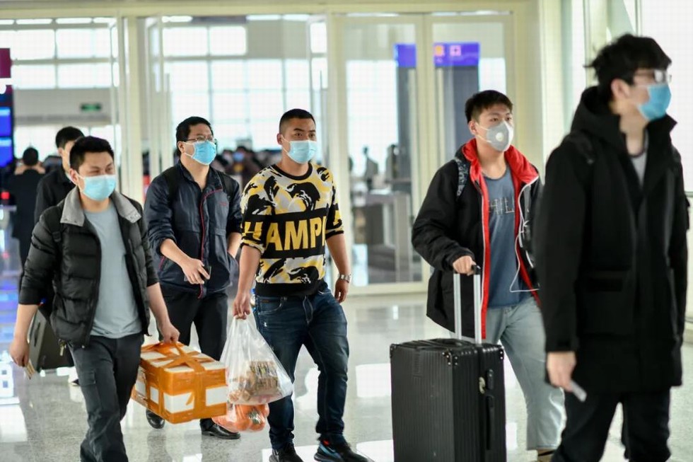 武汉首趟返岗复工专列接东风人“回家”