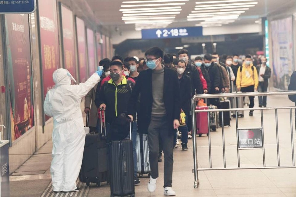 武汉首趟返岗复工专列接东风人“回家”