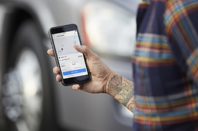 优步与特斯拉合作提高电动汽车采用率